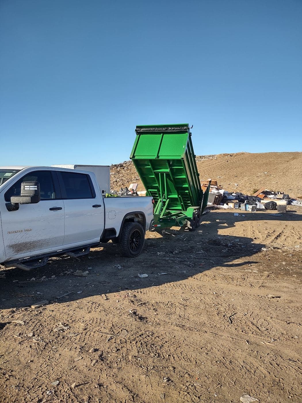 Othoniel's Junk Removal trailer unloading at the disposal facility